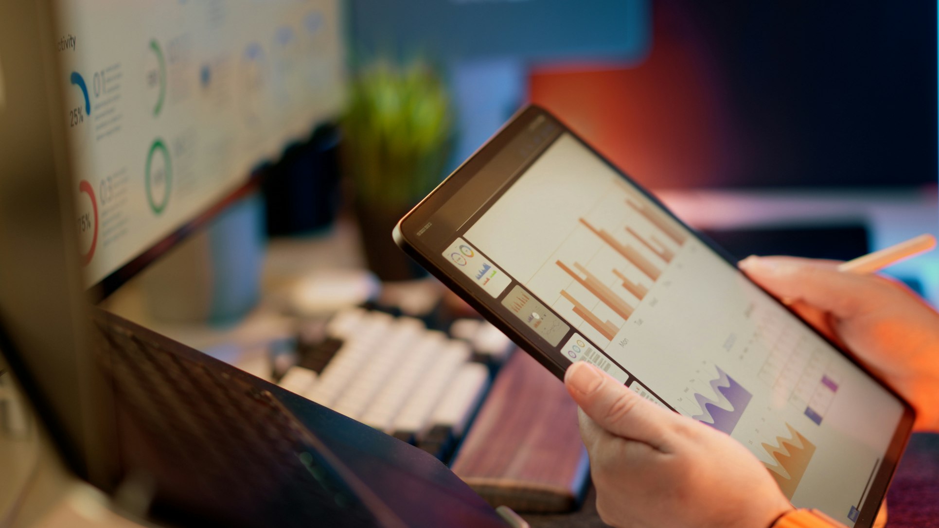 Financial and planning review on a tablet in a professional office setting